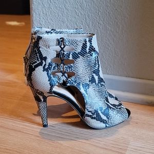 Snake skin print heeled booties